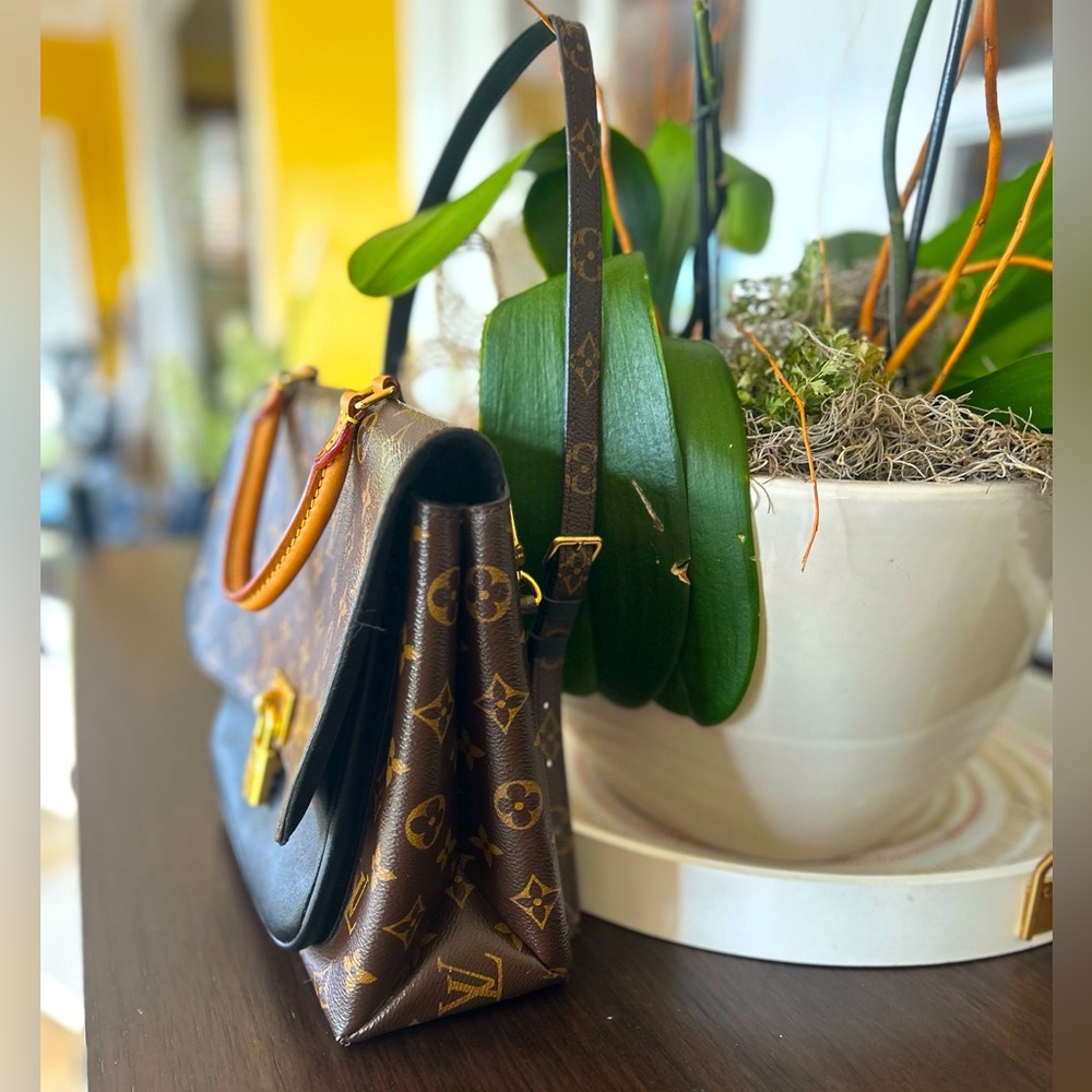 Louis Vuitton
Marignan Handbag Monogram Canvas with Leather $1600 - Picture 6 of 16